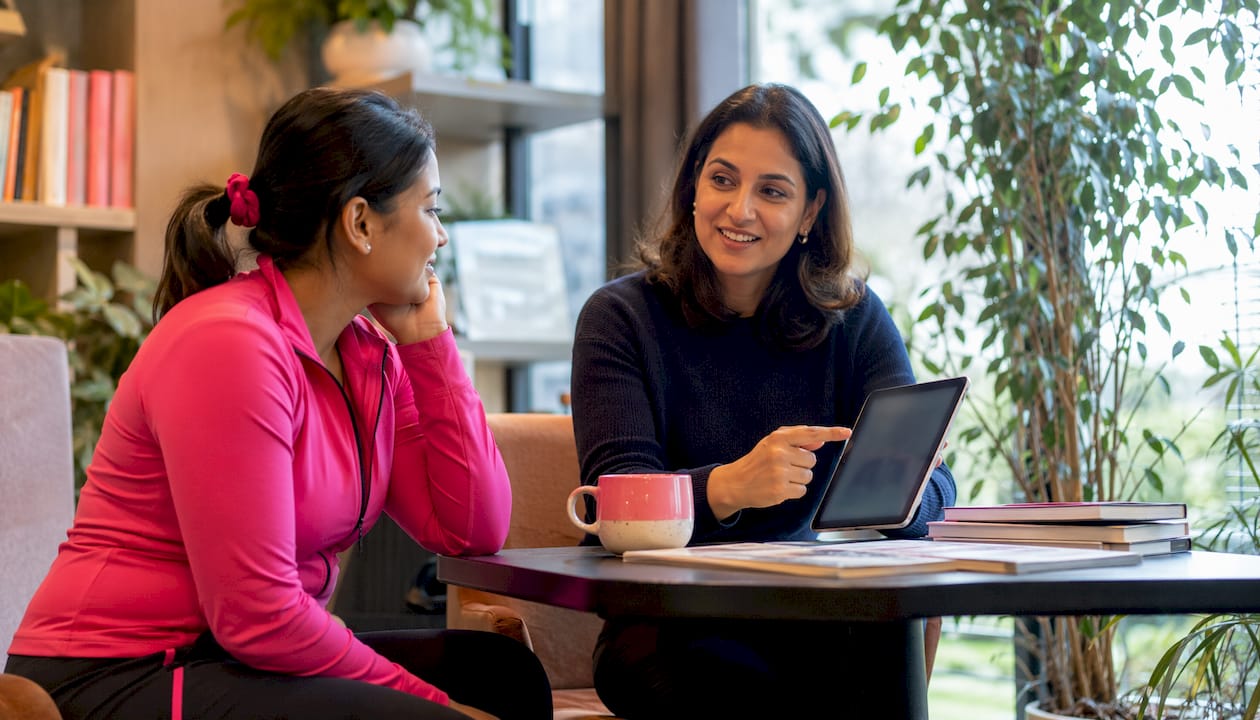 Patient consulting fertility specialist in clinic